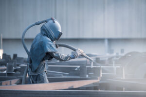 Sand Blasting Process Industial Worker,Using,Sand,Blasting,Process,Preparation